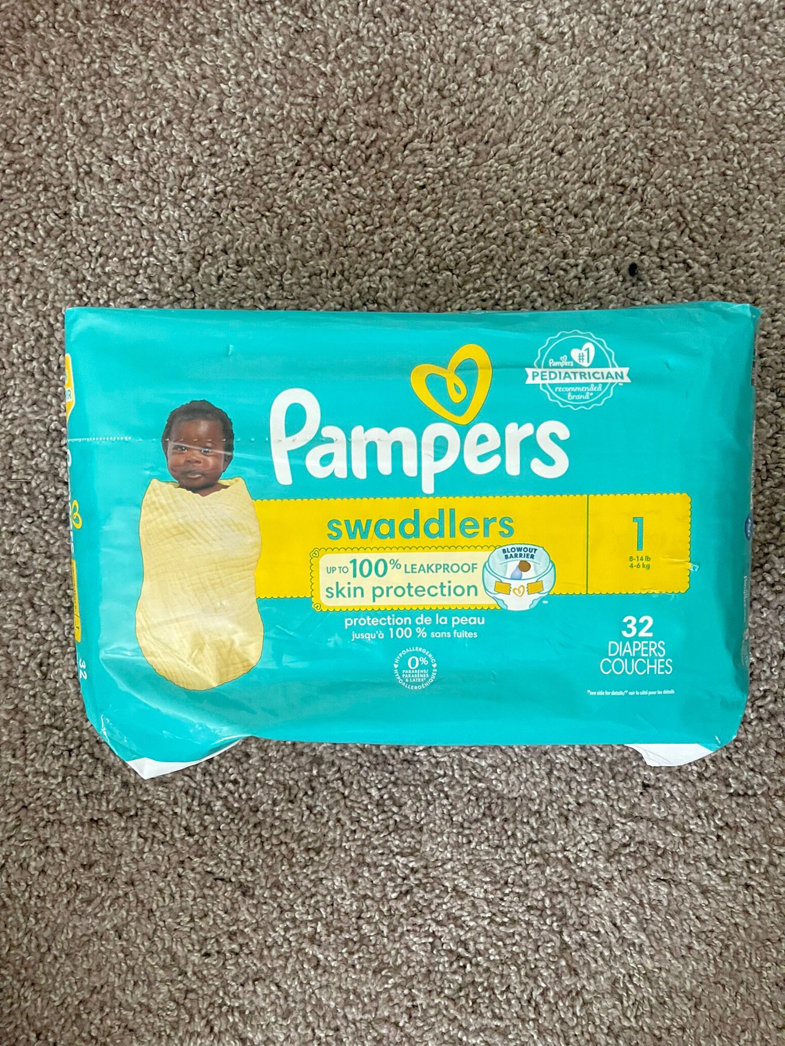 32 Pampers Swaddlers, Size 1