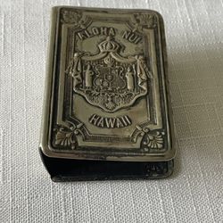 Early 1900’s Embossed metal "Aloha Nui Hawaii" souvenir matchbox holder.