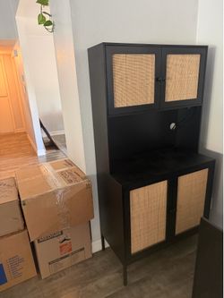 Black Hutch with wicker door fronts