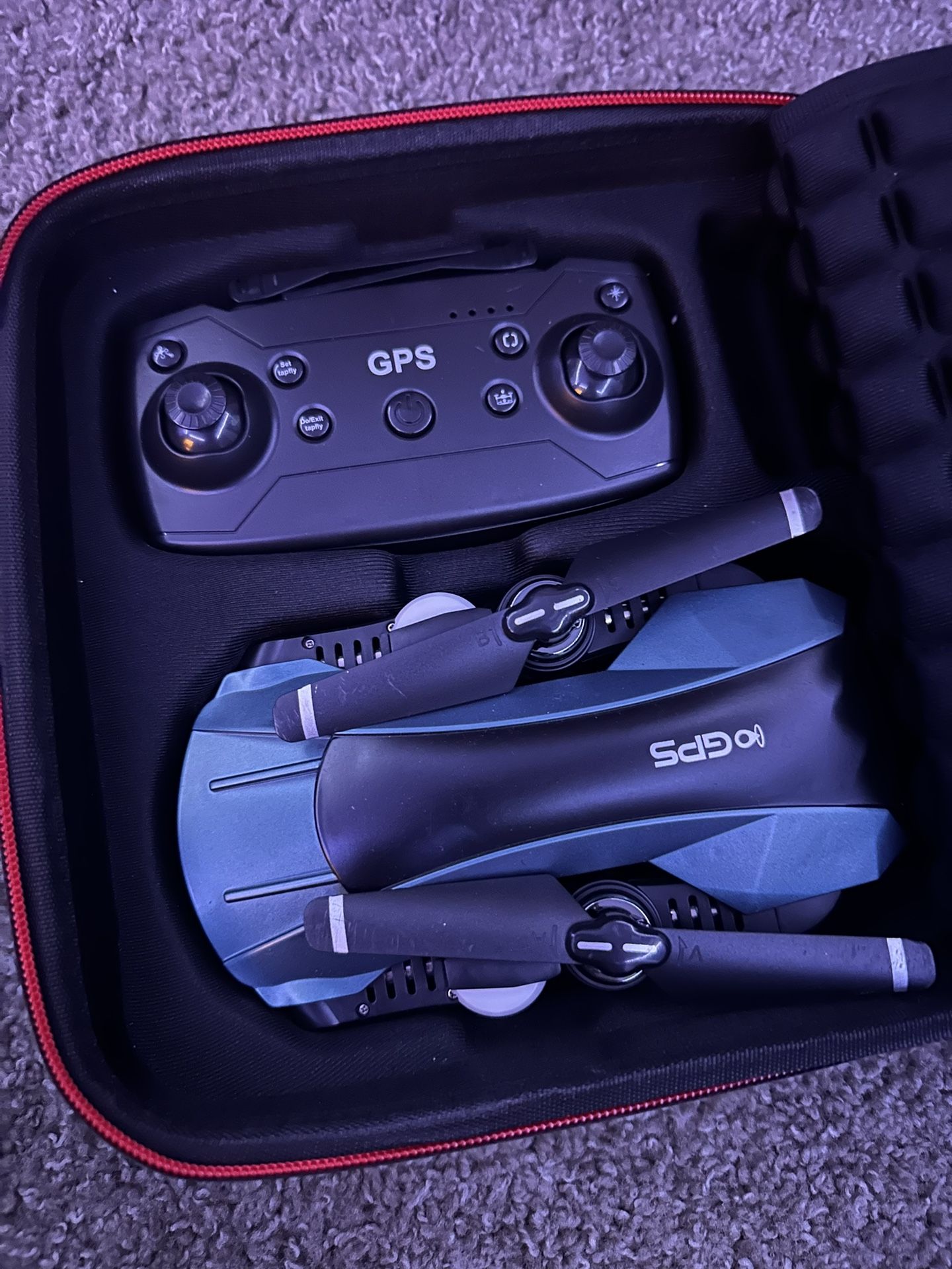 FOLDABLE DRONE WITH CAMERA AND GPS TECHNOLOGY ALSO WORKS WITH PHONE AS WELL AS THE REMOTE