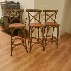 3 wooden chairs