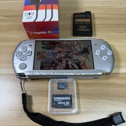 Silver PSP 3000 Console With 100 Games Installed.           E49