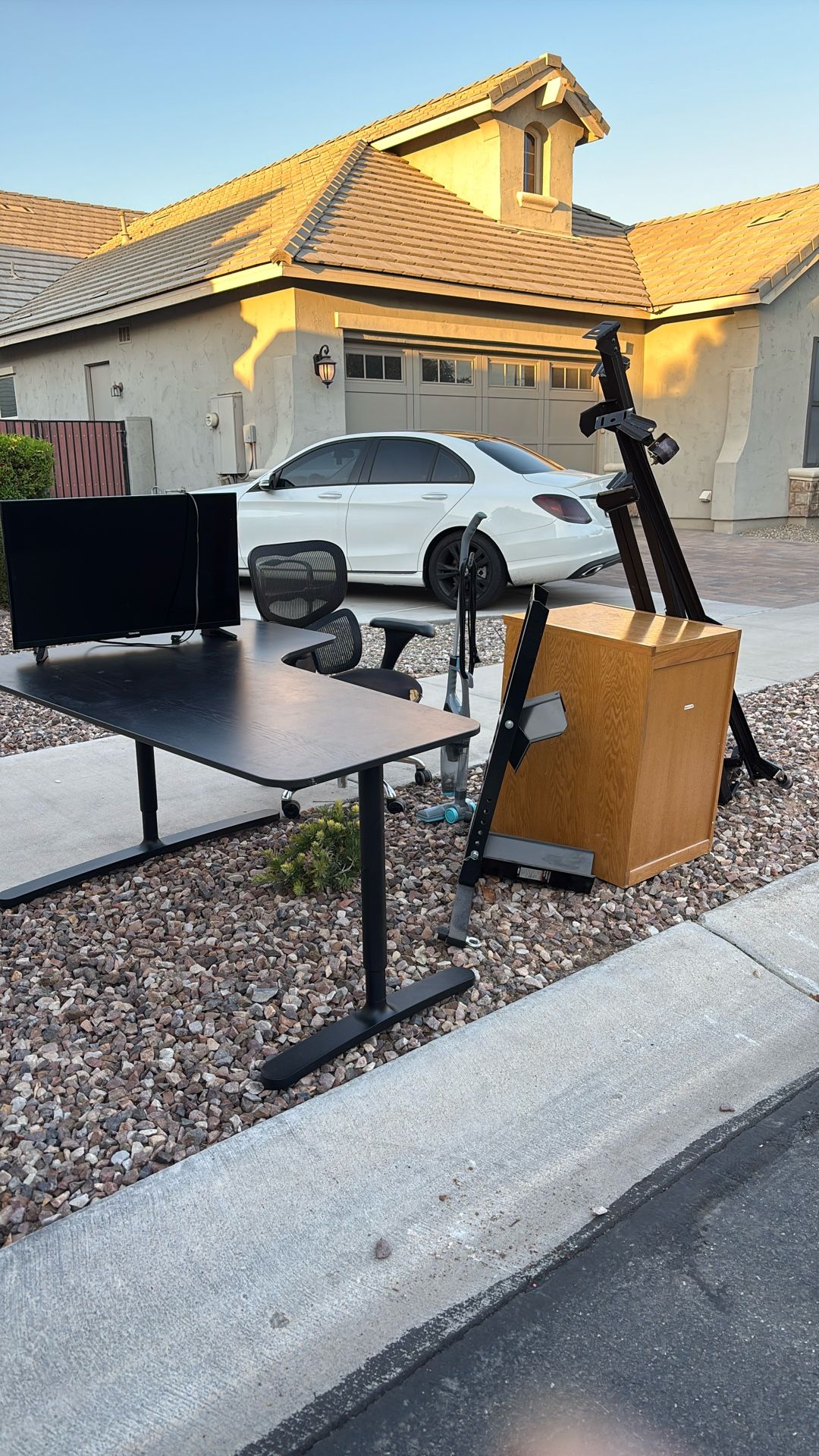 Free Motorcycle Stand, Desk, Bed Frame, Stick Vacuum File Cabinet And Desk Chair