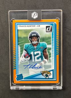 2025 Panini Donruss Rated Rookie Travis Hunter #301 Orange Autographs (RC)
