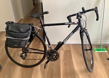 Black mercier bike with bag
