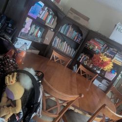 Big solid wood table with 6 nice chairs