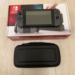 Nintendo Switch Version 1 + Case 