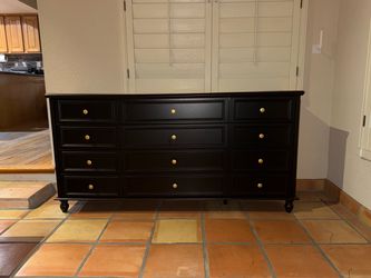 Black Wood Dresser with Gold Knobs