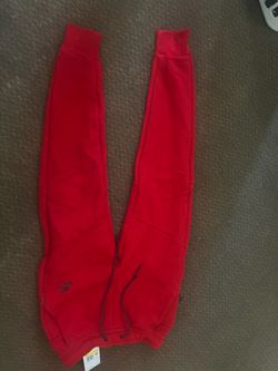 Red Nike tech pants brand new small