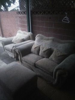 Matching love seat chair and ottoman