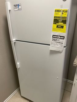 New ge top and bottom refrigerator white and service