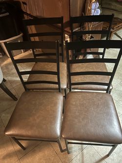 4 dining  chairs in ok condition