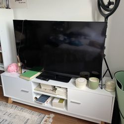 Tv stand, book shelf and tv