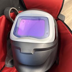 Automatic welding shield with helmet. Has belt that’s used with battery and charger. The speed glass welding shield and bag is new never used. Has new