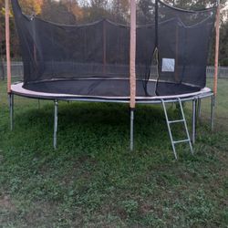 Trampoline And Swing Set