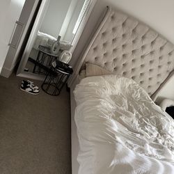 Velvet tuffted Queen bed and headboard living spaces