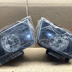 #47 NEW 2005-2009 Ford Mustang Black Halogen Headlight Pair
