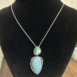 NEW, FIRM, STERLING SILVER LARIMAR AND TOURMALINE PENDANT IN A CZ HALO SETTING WITH AN 18-INCH STERLING SILVER CHAIN