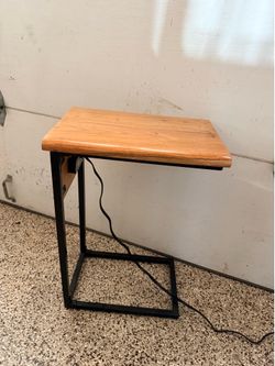 Couch table with charging station