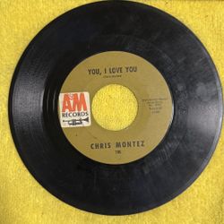 This item is a vintage Chris Montez 7-inch vinyl record (45 RPM) featuring the songs "You, I Love You" and "The More I See You," released on the A&M R