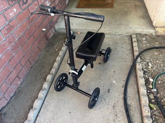 Four wheel foot bike like new $20
