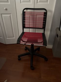 pink/ black bungee container store desk chair