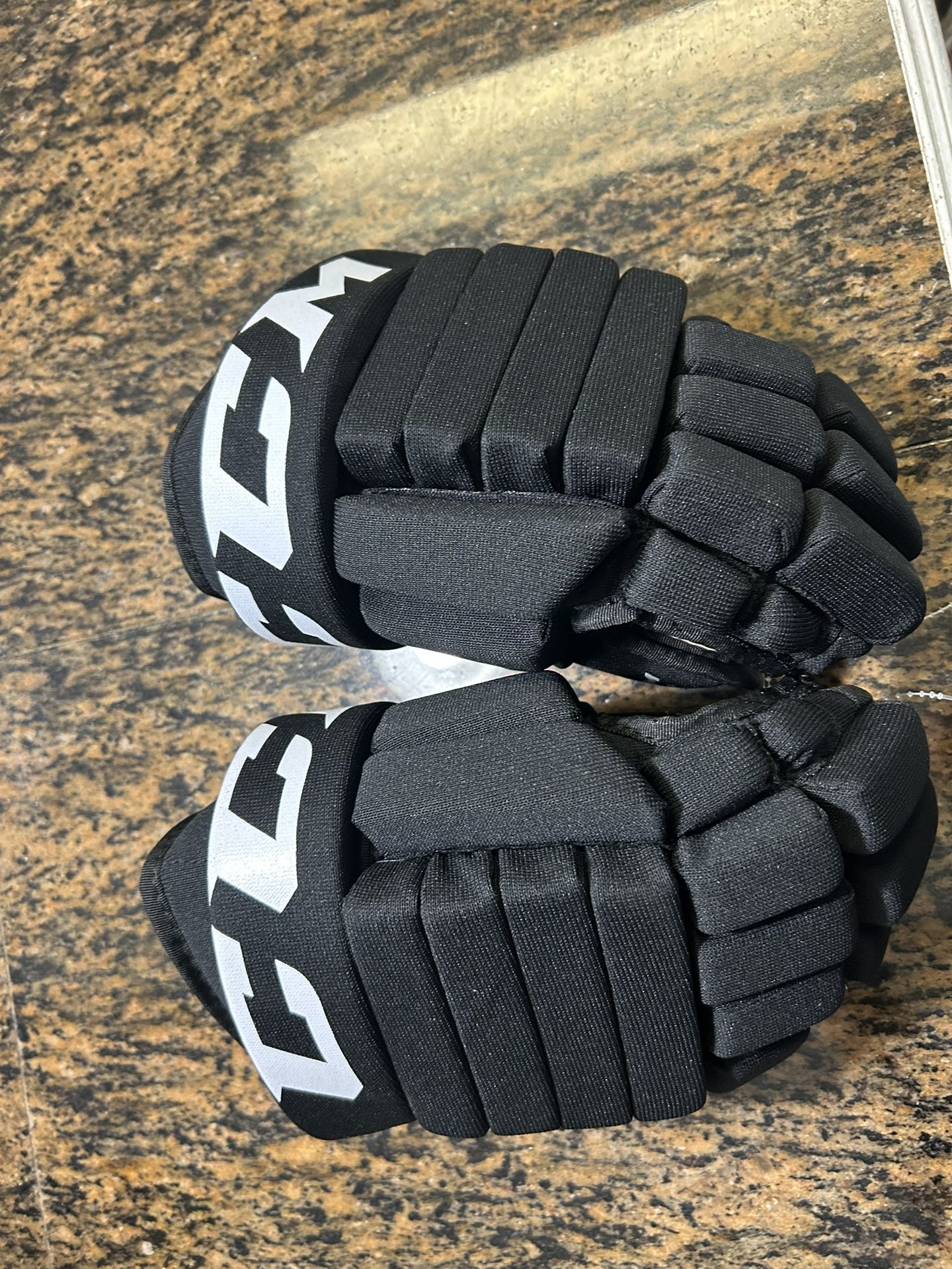New CCM hockey glove size 12