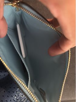 Coach corner zip wristlet in signature leather teal