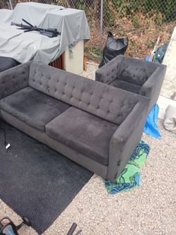 Grey micro fiber sofa with matching side chair