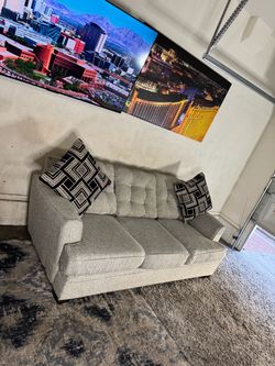 * Like New * Ashley Furniture 1pc modular sofa ( Free Delivery )