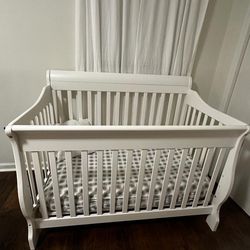 white baby crib