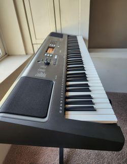Yamaha piano, keyboard, 76 keys, touch sensitive keys, stand, music rest. power cable, batteries, foot pedal, midi connection