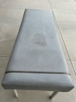 Massage table