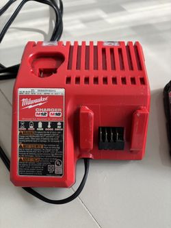 Milwaukee M12 and M18 Multi-Voltage Battery Charger & cordless drill