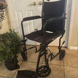 Drive transport chair. Dual hand brakes folds easily for easy transport has some sun fading otherwise great transport chair.