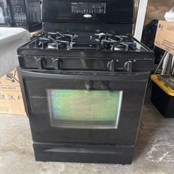 Whirlpool Stove And GE Microwave Oven 