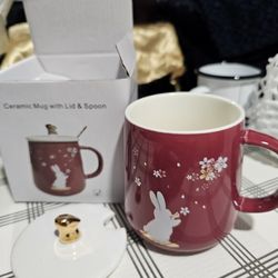 New ceramic rabbit cup with rabbit cover and metal spoon. 