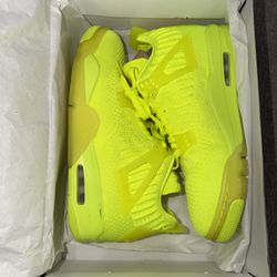 Jordan 4 Retro Flyknit Volt men’s size 8.5