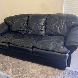 Two Black Leather Couches