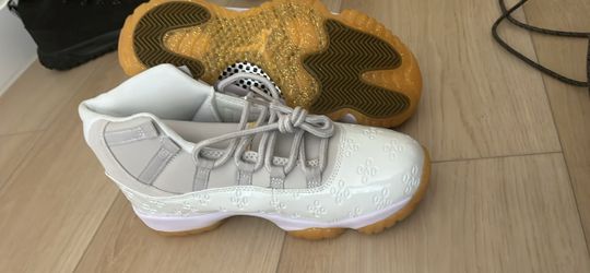 Air Jordan 11 Low White Gum Sneakers