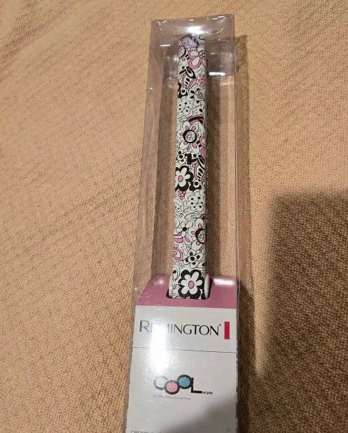 💥Weekly Deal: New!Remington Ceramic Hair Iron /straigh Pink Design. Ceramic plates 400•F high heat ( reseda) Limited Edition