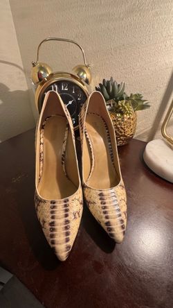 Snake Print Pointed-Toe Heels. Michael Kors