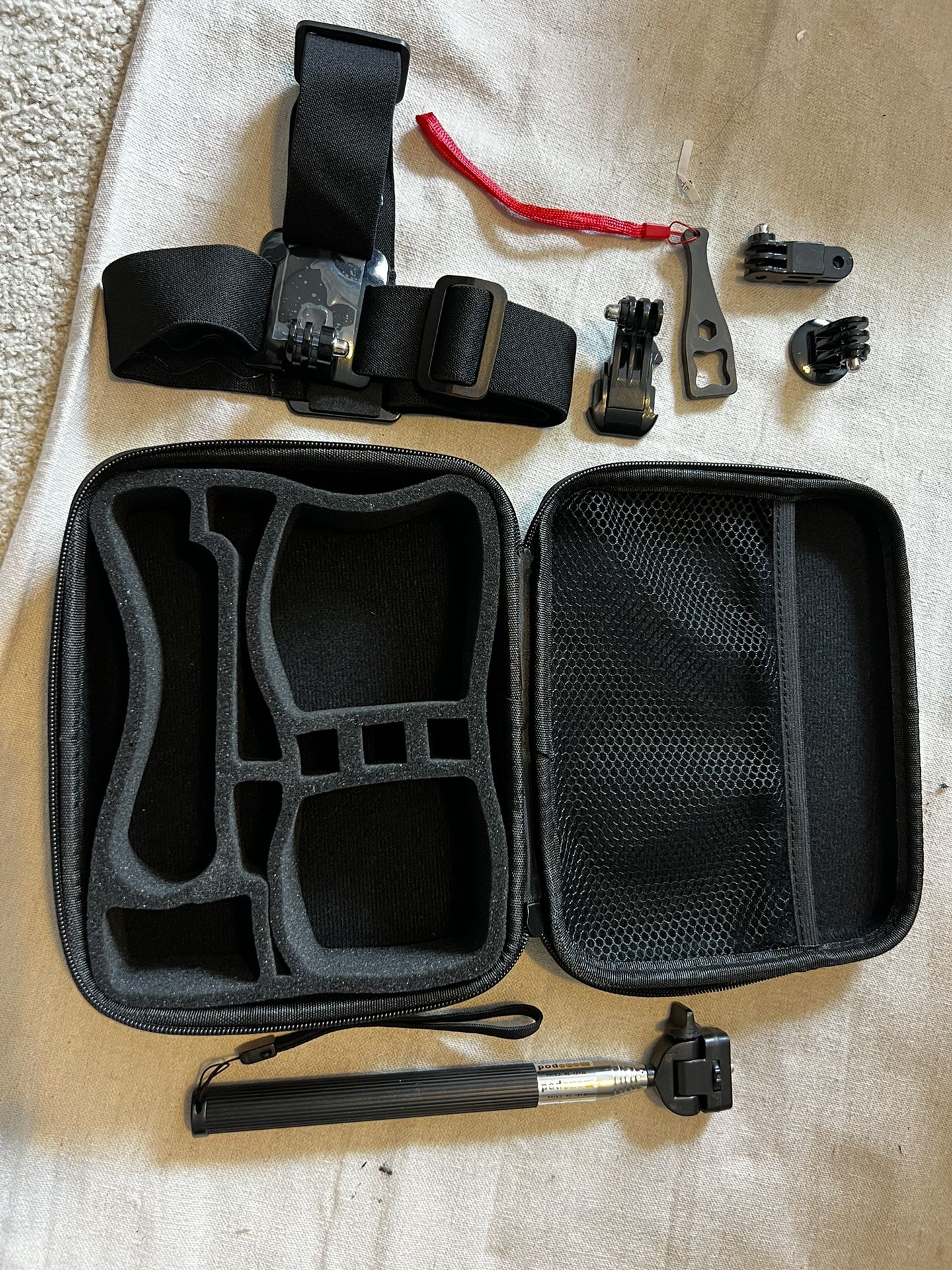 GoPro Case w/ Selfie Stick And Random Bits