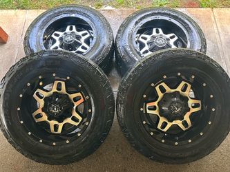 17x9 TIS Offroad Wheels & A/t Tires