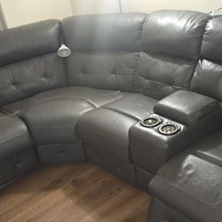 LARGE DARK GREY LEATHER COUCH RECLINES/LED LIGHTS/CUPHOLDERS