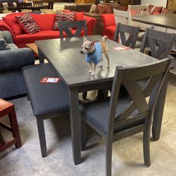 Brand new table and four chairs, 699