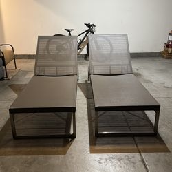 Two Hydraulic chase lounges from Crate and barrel