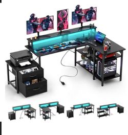L-shaped computer desk gaming desk with power sockets and LED light strip, storage rack, black