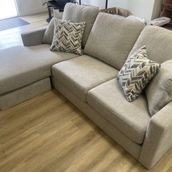 Brand New Living Spaces Reversible Chaise Sofa