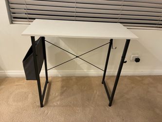 White Top Desk with Black Metal Frame. And LG monitor